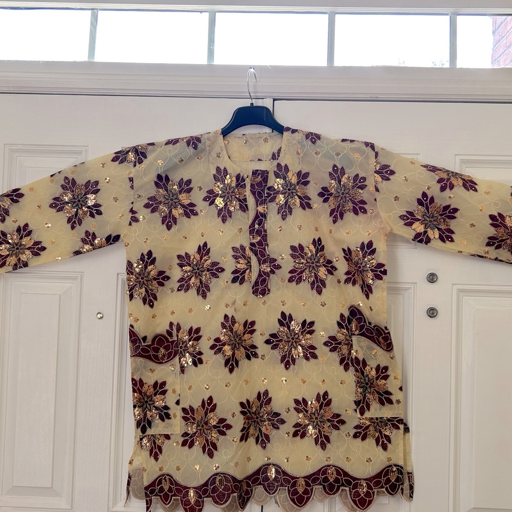 Handmade ethnic top with beautiful accents. Perfect for formal events!